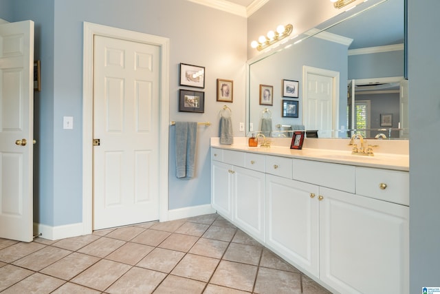 bathroom featuring vanity, ornamental molding, and tile patterned floors