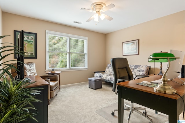 home office featuring ceiling fan and light colored carpet