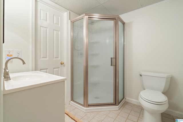 bathroom featuring toilet, walk in shower, vanity, and tile patterned flooring