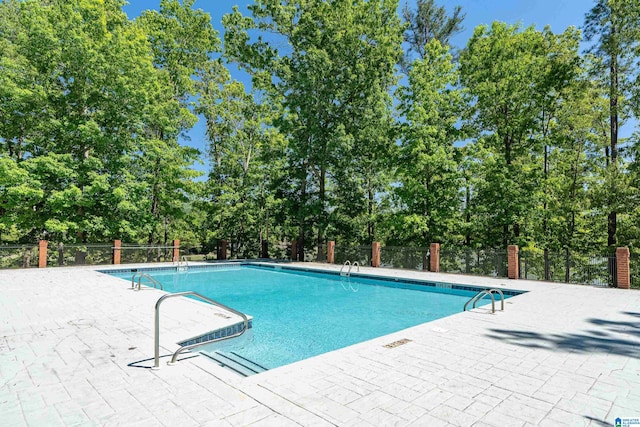 view of pool with a patio