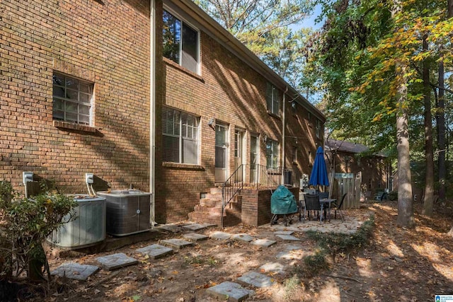 2061 Montreat Cir Unit C, Vestavia Hills, AL 35216 - view of property exterior with central AC and brick siding