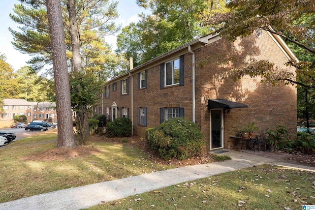 2061 Montreat Cir Unit C, Vestavia Hills, AL 35216 - view of front of house featuring a front yard and brick siding