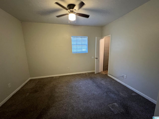 unfurnished room with carpet and ceiling fan