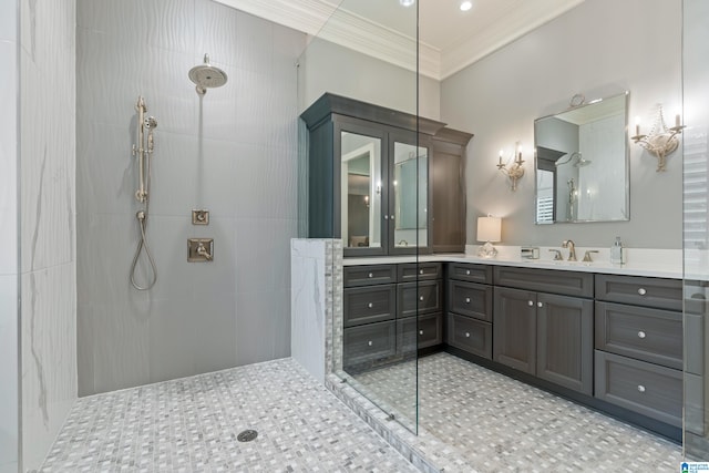 full bathroom featuring ornamental molding, vanity, and walk in shower