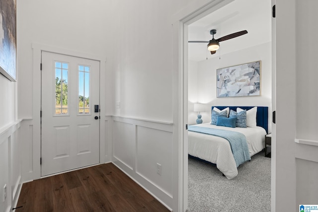 bedroom featuring ceiling fan and dark hardwood / wood-style flooring