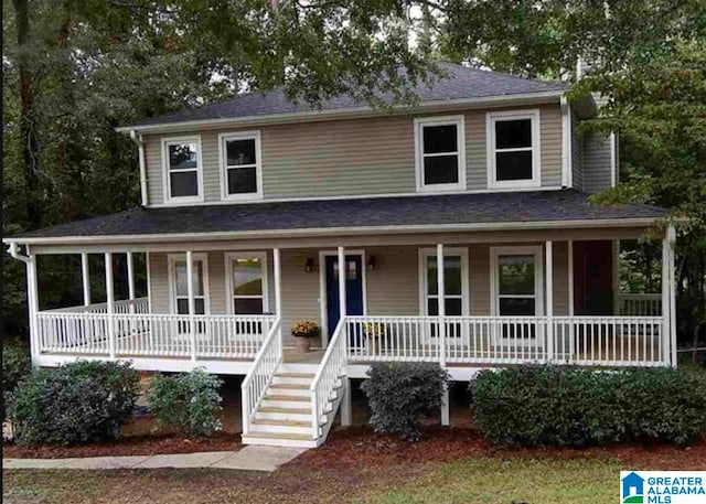 farmhouse-style home featuring covered porch