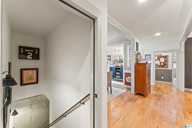 corridor featuring light hardwood / wood-style floors