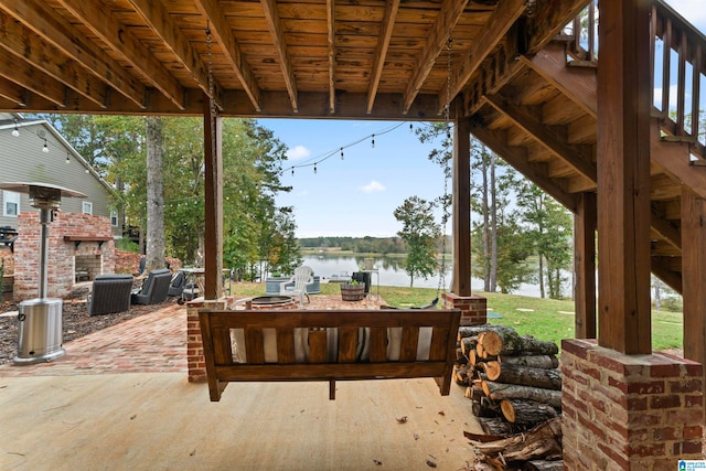 view of patio / terrace featuring a water view