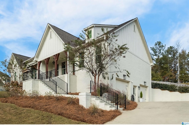 view of side of property with a garage