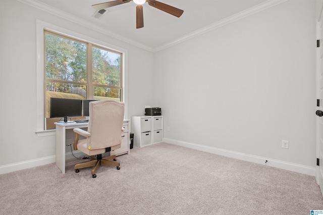 carpeted home office with crown molding and ceiling fan