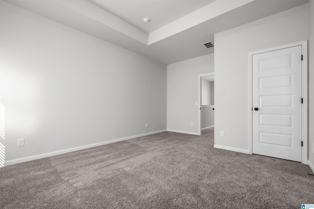 spare room with carpet floors