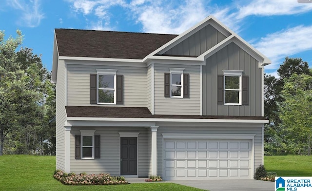 view of front of house with a garage and a front yard