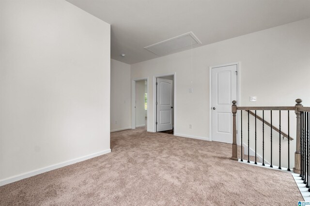 unfurnished room with carpet flooring