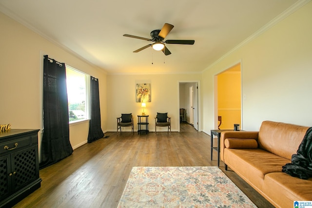 living room with ornamental molding, hardwood / wood-style floors, and ceiling fan