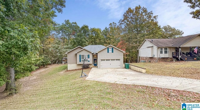 view of front facade with a front yard and a garage