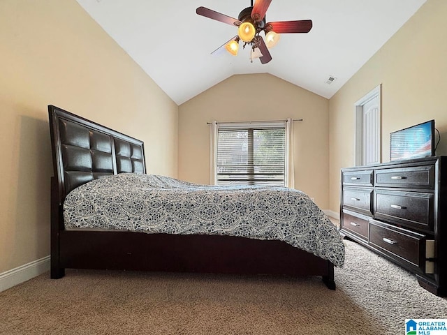 carpeted bedroom featuring lofted ceiling and ceiling fan