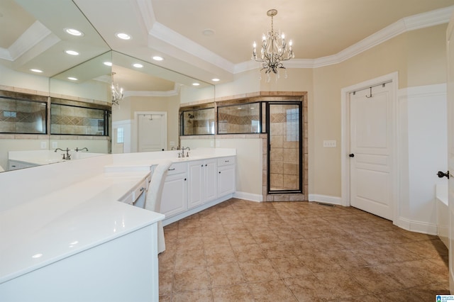 bathroom with a shower with door, ornamental molding, an inviting chandelier, vanity, and tile patterned floors