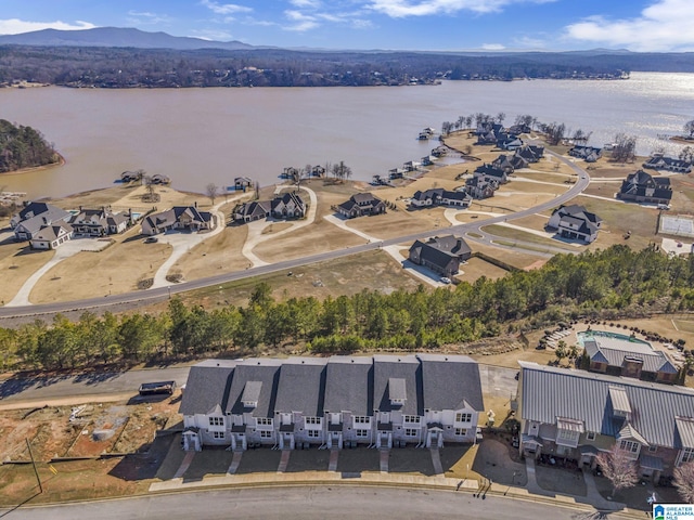 birds eye view of property featuring a residential view and a water view