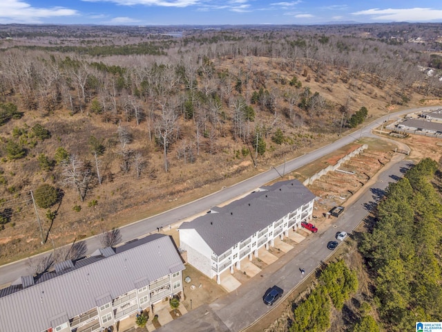 bird's eye view featuring a forest view