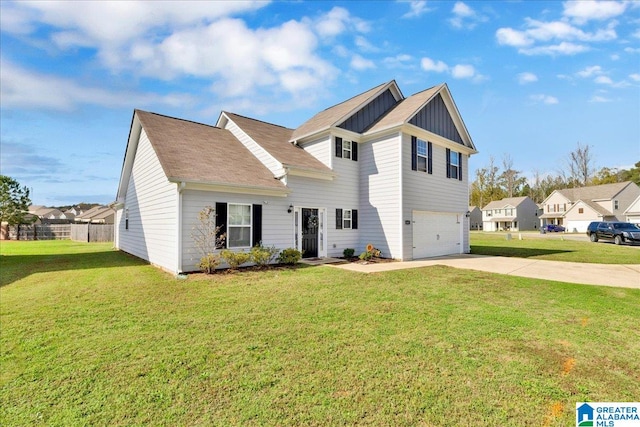 view of front of property with a garage and a front lawn