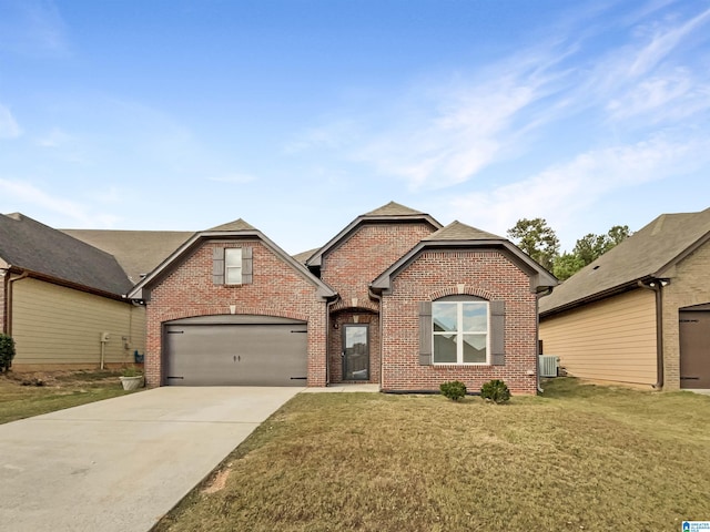 view of front facade featuring a front lawn and a garage