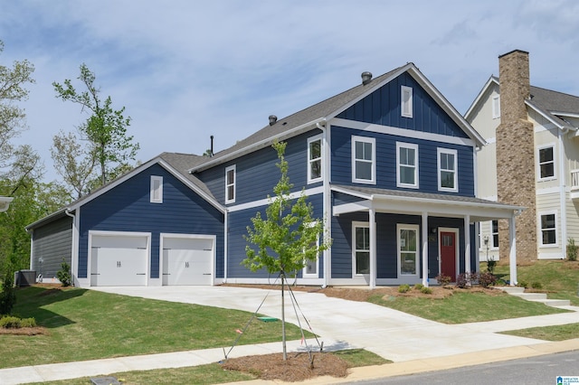 194 Barimore Blvd, Helena, AL 35080 - view of front of property with concrete driveway, a front yard, covered porch, and board and batten siding