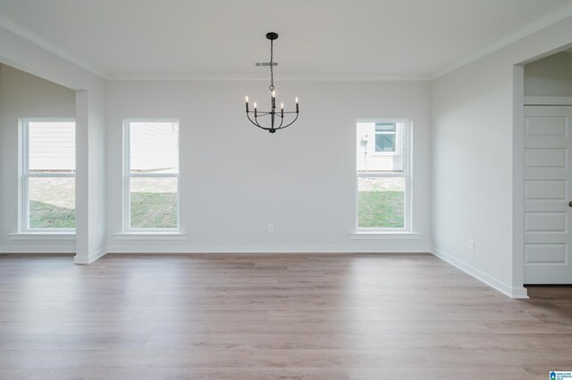 194 Barimore Blvd, Helena, AL 35080 - unfurnished dining area featuring a chandelier, crown molding, and light wood-type flooring