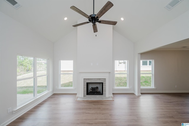 194 Barimore Blvd, Helena, AL 35080 - unfurnished living room featuring high vaulted ceiling, a fireplace with flush hearth, plenty of natural light, ceiling fan, and wood finished floors