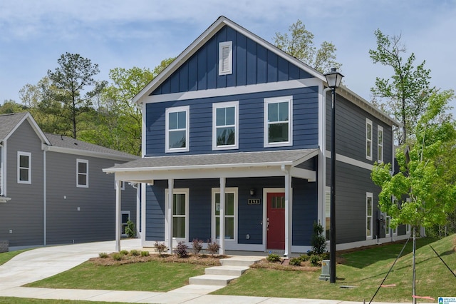 194 Barimore Blvd, Helena, AL 35080 - view of front of home with covered porch, board and batten siding, and a front yard