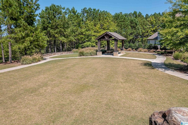 surrounding community featuring a gazebo and a yard