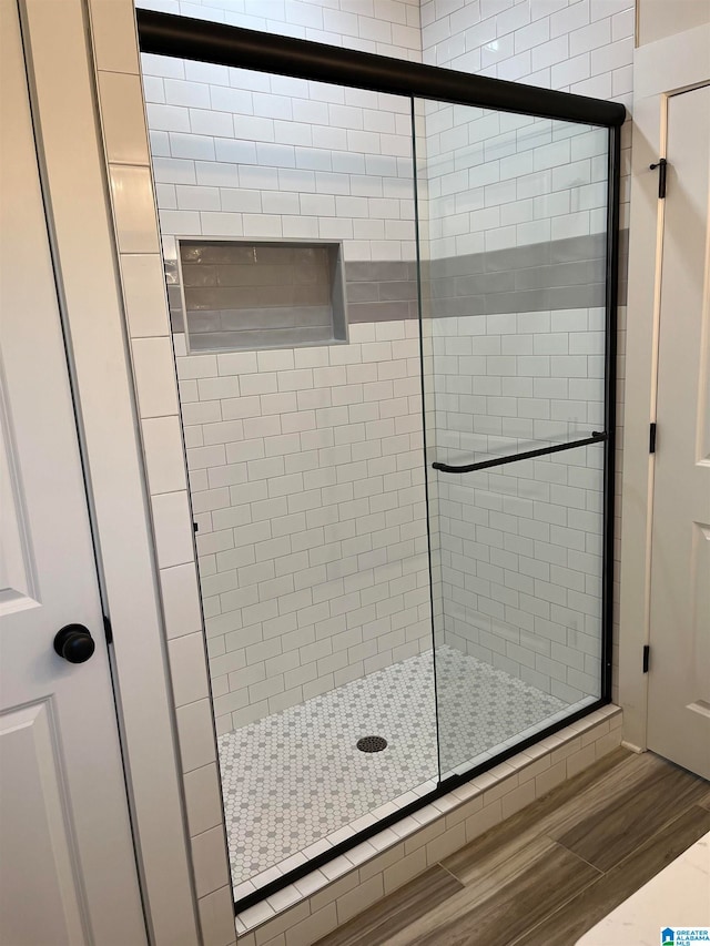 bathroom featuring walk in shower