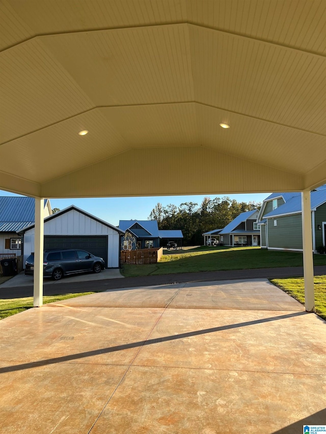 view of patio with a garage and a carport