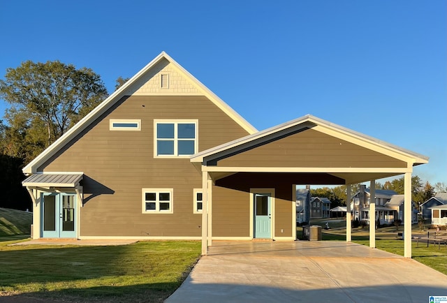 rear view of house with a yard