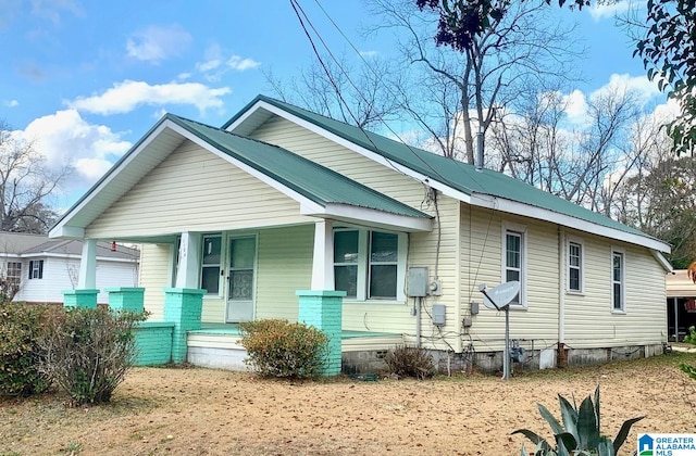 exterior space with covered porch and crawl space