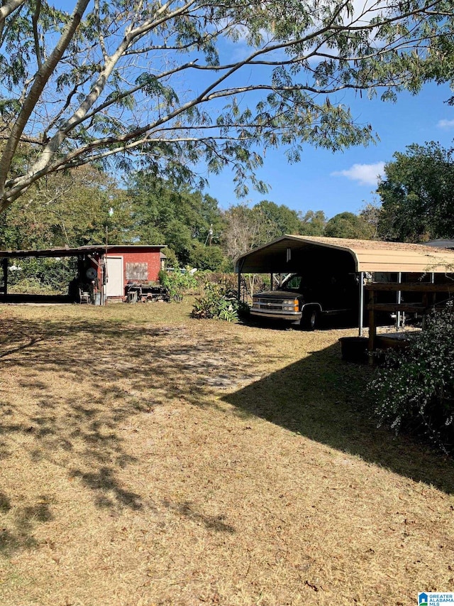 1304 2nd Ave N, Clanton, AL 35045 - view of yard with a carport