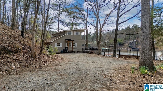 view of front of house with fence