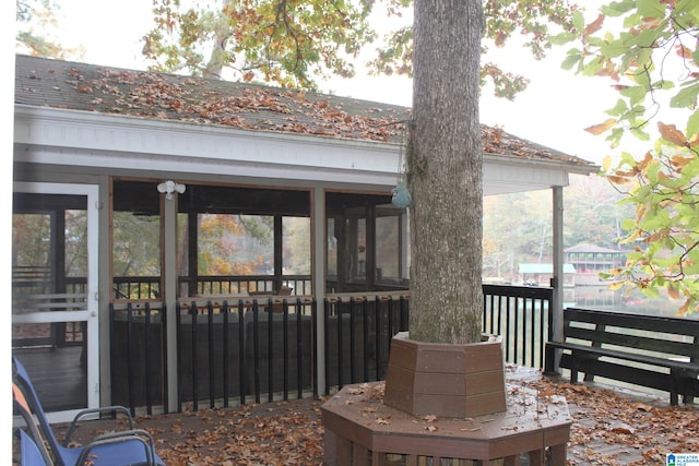 exterior space featuring a sunroom