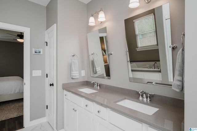 bathroom with vanity and ceiling fan