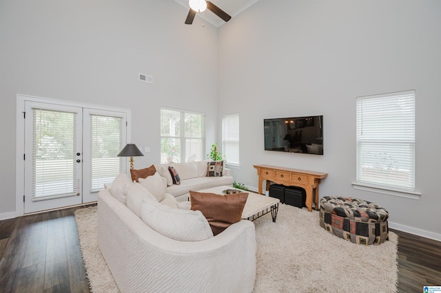 living room featuring french doors, ceiling fan, high vaulted ceiling, and dark hardwood / wood-style flooring