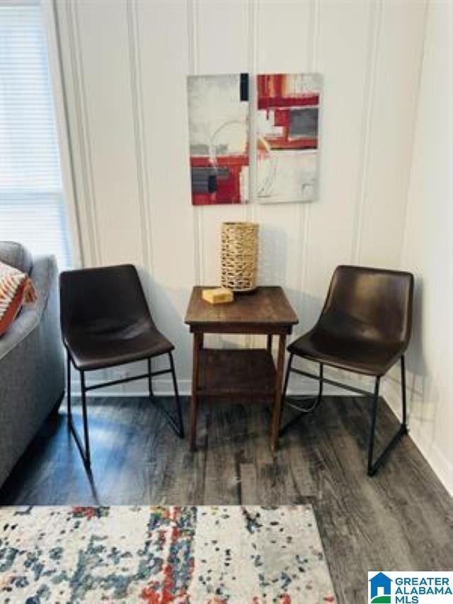 2101 SW Main St, Cullman, AL 35055 - sitting room with wood finished floors and baseboards