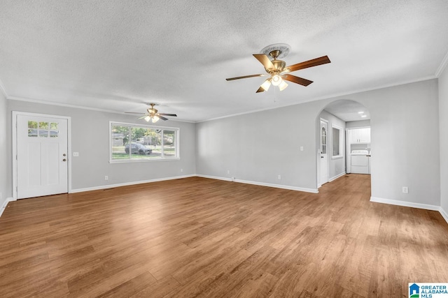 unfurnished living room with crown molding, a textured ceiling, ceiling fan, and light wood-type flooring