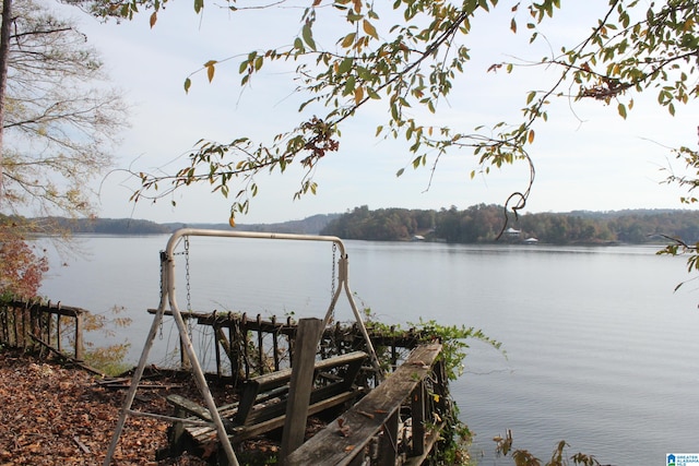 view of dock with a water view