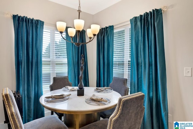 dining room with a chandelier