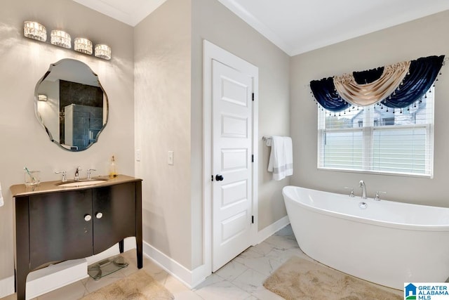 bathroom featuring vanity, ornamental molding, and a tub to relax in