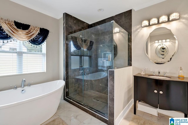 bathroom featuring vanity and separate shower and tub