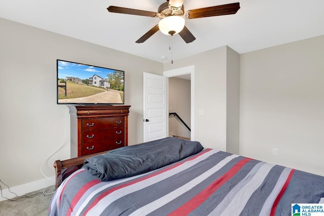 carpeted bedroom featuring ceiling fan