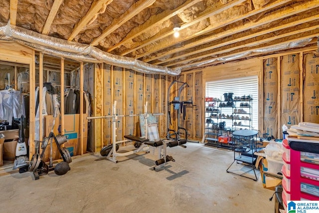 workout area featuring concrete floors