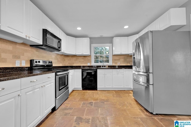 kitchen with backsplash, white cabinetry, and black appliances