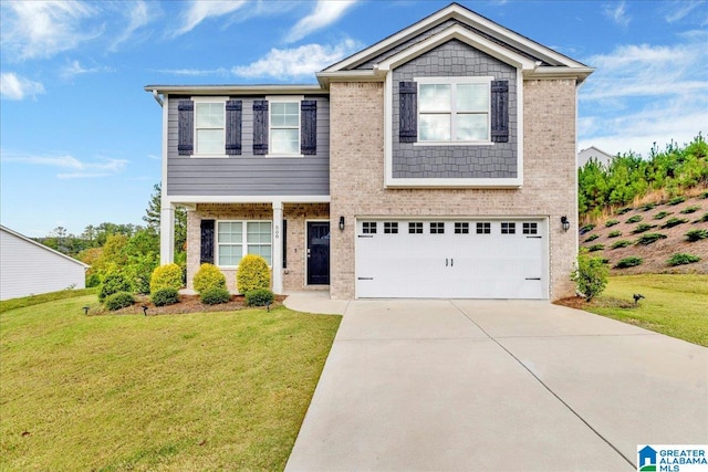 view of front of property featuring a garage and a front yard