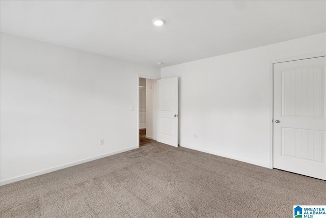 view of carpeted spare room